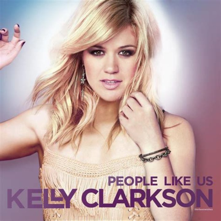 Kelly Clarkson Dons a Lab Coat, Plays a Kind Researcher in ‘People Like Us’ Video