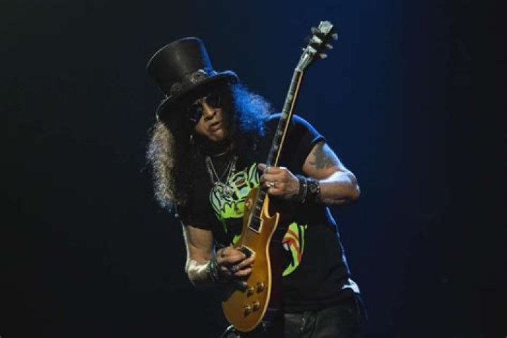 Slash Biography, Age, Wiki, Height, Weight, Girlfriend, Family & More